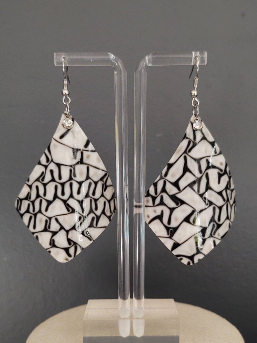 Black, white and taupe acrylic earrings with cz accent